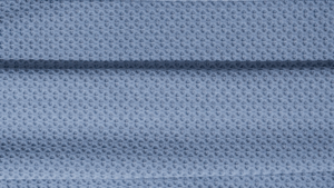 Tecido tecnológico Triad 8821 azul com textura tridimensional, ideal para activewear e sportwear.