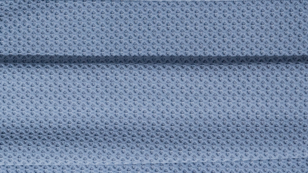 Tecido tecnológico Triad 8821 azul com textura tridimensional, ideal para activewear e sportwear.
