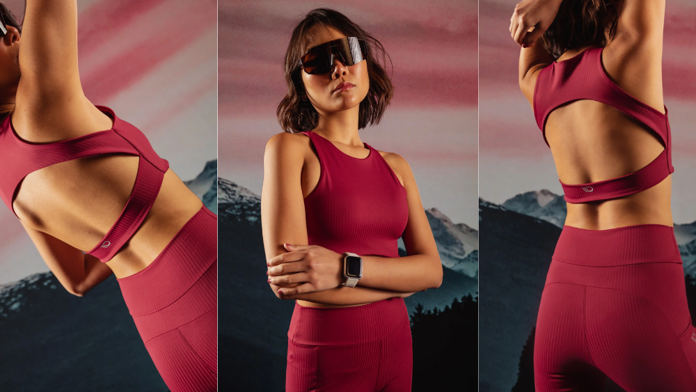 Modelo usando conjunto esportivo desenvolvido com o artigo Lane da Diklatex, tecido de activewear com estrutura canelada, compressão e conforto para performance esportiva.