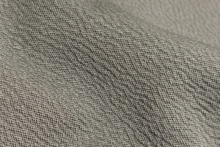Tecido respirável Eco Unique do Casual Tech® em detalhe, destacando a textura e a construção da malha.