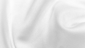 Tecido de secagem rápida branco em close-up, destacando a textura da malha e sua estrutura têxtil para aplicações em roupas esportivas de alta performance.